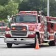 fire trucks in foreground, background