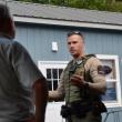 Maine Forest Ranger and Camden Fire Chief Chris Farley talk about the origin of the fire. (Photo by Lynda Clancy)
