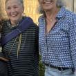 two women pose for picture