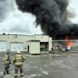 orange flames, black plume