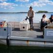 people ride in boat