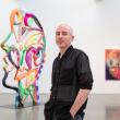 man in art gallery