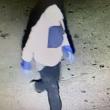 surveillance camera footage, grainy image