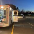 Camden Fire and Rescue and North East Mobile Health Service first responders transfer a cardiac arrest patient from the back of the ambulance to a waiting LifeFlight 