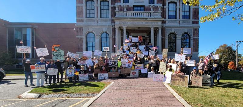 Photographer Christy Benoit gathered participants on the Knox County Court House steps for a photo after the No Kings Protest in Rockland
