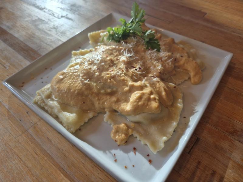 Savory pumpkin cream sauce over four-cheese ravioli for a T-Day side dish. Photo by Kay Stephens