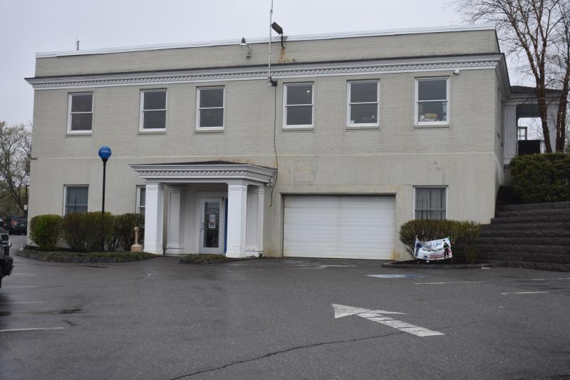 Police station building entrance, no vehicles
