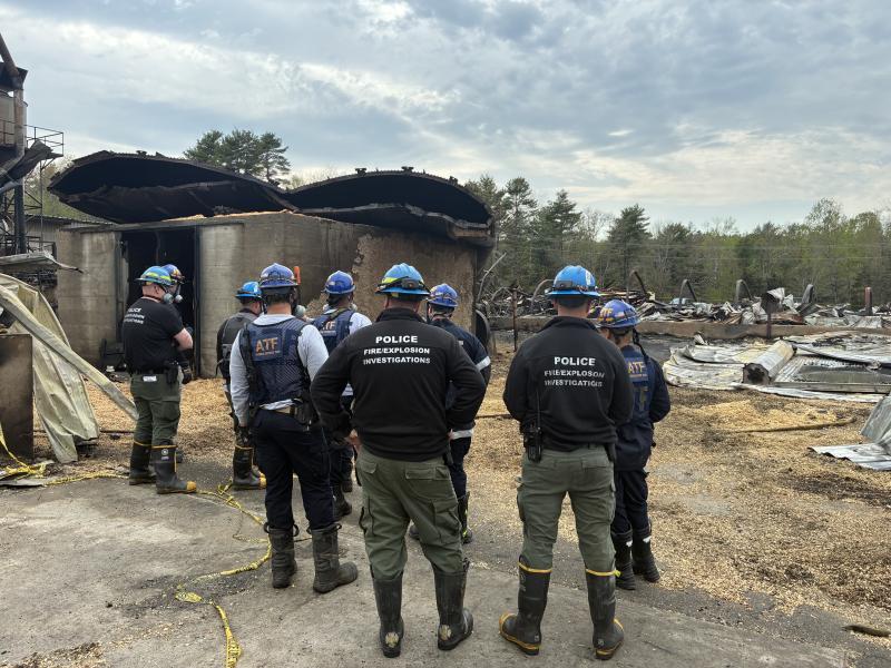 specialized investigators at fire scene