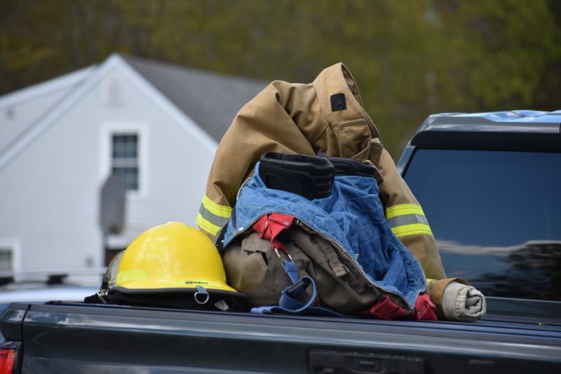 pile of turn-out gear pieces