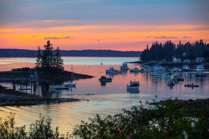 sunset over a harbor