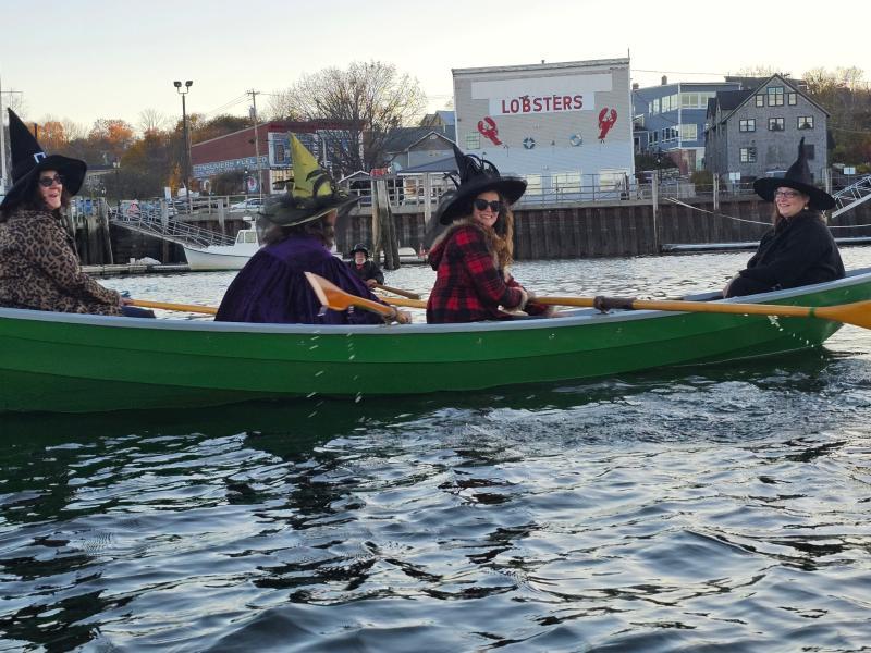 four witches in a boat