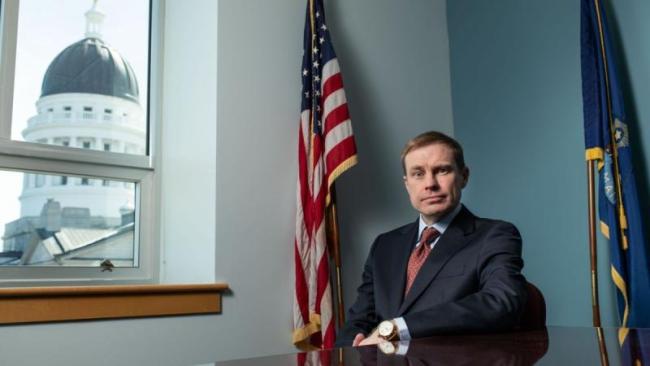 aaron frey poses for a photo