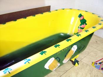 The "Irish Tub," a cast iron clawfoot colorfully refinished by Coughlin with help from a local artist. (Photo by Ethan Andrews) The "Irish Tub," a cast iron clawfoot colorfully refinished by Coughlin with help from a local artist. (Photo by Ethan Andrews)