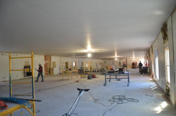 An empty space, formerly filled with offices and cubicles, is being renovated for more offices, and cubicles. (Photo by Lynda Clancy)