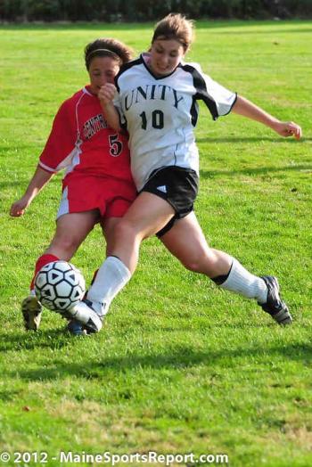 CMCC’s Kim Migliaro, left, and Unity’s Michelle Wagner battle for the ball. (Photo Courtesy of Skip Hawkes)
