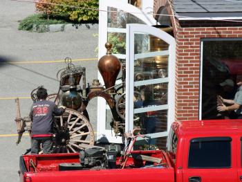 Camden's 1892 horse-drawn steam fire pumper heads outside on the anniversary of 9/11.