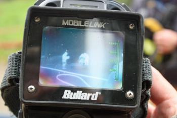 Pointing a wireless heat sensing camera back at us, we can see what a firefighter sees when the camera is taken inside a building to look for hot spots. (Photo by Holly S. Edwards)