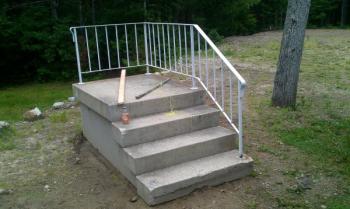 Concrete stairway with iron railing (Buxton)