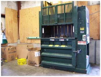 A baler similar to the one transfer station workers are expecting to arrive soon for compacting a variety of plastics not previously accepted at the facility. (Photo by Ethan Andrews)