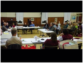 Steve Hinchman, center, attorney for two groups opposing the LPG facility addresses the Searsport Planning Board, Oct. 8. (Photo by Ethan Andrews)