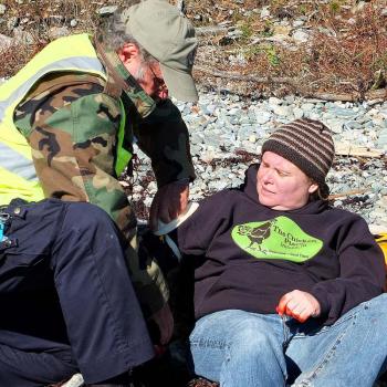 A 'victim' suffering an amputated hand gets a tourniquet during Saturday's mass casualty drill. (Photo by Holly S. Edwards)
