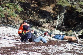 Volunteer victims being tended by rescuers Saturday on Lasell Island. (Photo by Holly S. Edwards)