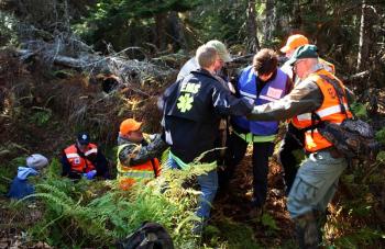 Rescuers during Saturday's mass casualty drill were evaluated in everything they did, including how safely and effectively they extricated injured victims from precarious places. (Photo by Holly S. Edwards)