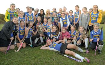 A care free and happy Troy Howard field hockey team is all smiles after winning the championship. (Photo by Ron Hawkes)