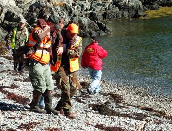 Knox and Waldo counties Emergency Management Agencies conducted a mass casualty drill on Lasell Island, in Penobscot Bay, Oct. 13. The scenario involved a downed 16-passenger aircraft with 15 people unaccounted for. Midcoast and Waldo County Search and Rescue crews were dispatched to the island to find the 'victims' and render aid for a variety of hypothetical injuries and life-threatening conditions. (Photo by Holly S. Edwards)