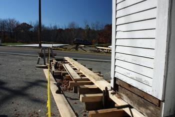 The former Center School building in Lincolnville is ready for its big move across the road to the former Dean & Eugley Garage site Saturday, Oct. 28 at 8:30 a.m. Route 52/173 will be closed from 9 to 11 a.m. and traffic diverted at Drake Store (Beach Road) and Petunia Pump (Route 235) during the move. (Photo by Holly S. Edwards)