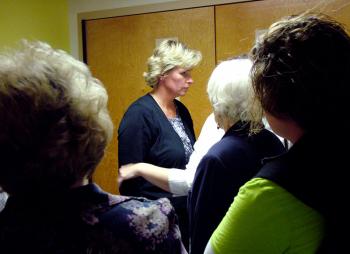 Mount View Middle School teacher Eileen Ellis, center, with supporters during a break in a closed door session of the RSU 3 school board on Sept. 10 at which grievances filed in the spring by she and another teacher were denied. A week later both grievances were quietly resolved. (Photo by Ethan Andrews) Mount View Middle School teacher Eileen Ellis