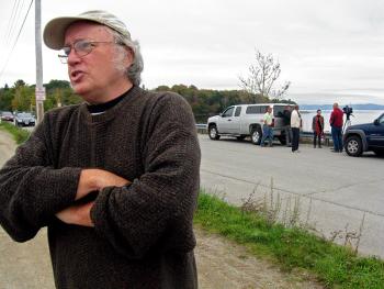 Activist Ron Huber stands on the Sears Island causeway Oct. 4 after the announcement of a new advocacy group, Friends of Penobscot Bay. Representatives of the fishing and tourism industries and others formed the umbrella organization to address changes occurring in the marine ecosystem of the bay. (Photo by Ethan Andrews)