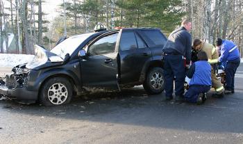 Justin Hills at the scene of a car-school bus accident in Camden. (Photo by Holly S. Edwards)