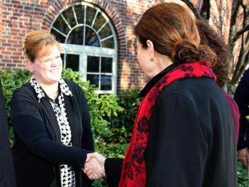 Staci Coomer, executive director of the Penobscot Bay Regional Chamber of Commerce, greets Sen. Olympia Snowe in Camden. (Photo by Holly S. Edwards)