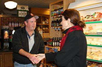 Sen. Olympia Snow greets French & Brawn owner Todd Anderson Nov. 1. (Photo by Holly S. Edwards)