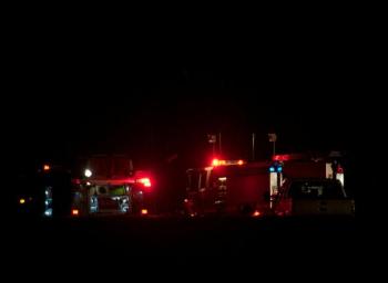Firefighters from Rockland, Owls Head and South Thomaston extinguished the burning Cessna that crashed at Knox County Regional Airport Friday night. (Photo courtesy Steve Waterman)