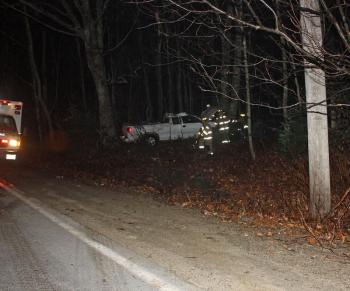 The truck narrowly missed a utility pole, far right, before crashing in Camden. (Photo by Holly S. Edwards)