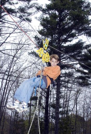 Justin Hills' son, Alexander Copeland, likes to tag along and participate in training when he can. (Photo by Holly S. Edwards)