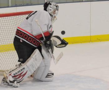 MCSA Storm's Andrew Sorterup makes a save during the Bantam game against Casco Bay. (Photo by Ron Hawkes)