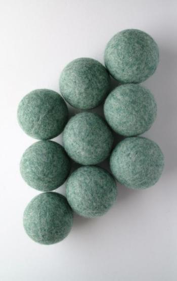 A wool dryer ball is a felted ball of wool that you use in your clothes dryer to help separate your clothes. (photo: LooHoo)