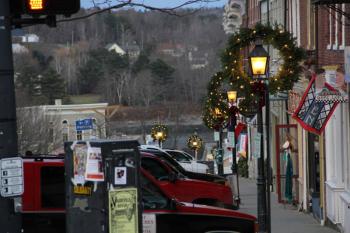 Christmas wreaths line Main Street in downtown Belfast. (Photo by Wes Sterrs)