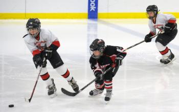 The MCSA Storm Squirts Tier 3 team hosted the Maine Gladiators from Lewiston/Auburn Sunday and the two teams skated to a 4-4 tie. (Photo by Ron Hawkes)
