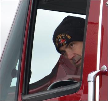 Brian Englander gets into the driver's seat. (Photo by Lynda Clancy)
