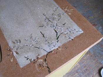 Inlaid recycled glass from the Transfer Station in concrete countertop. (photo: Alternative Rock, LLC)
