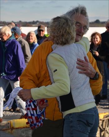 Stanly Paris thanks Heidi Lyman for christening his new cruising yacht.
