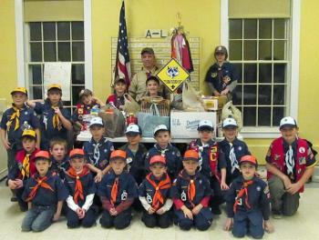 Front row from left - August Knause, Alex Todd, J.T. Johndro, Preston Henderson, Billy Kurzius, Cole Thompson; middle row - Matthew Clayton, Owen Weber, Brian Bland, Zackary Woehler, Joey Corey, Finn Mills, Alex Kurzius, Chris Cammelieri; back row - Greyson Orne, Jacob Pendleton, Wesley Henderson, Tanner Robinson, Zackery Wellman, Michael Brennan and Cub Master Brian Hebert.