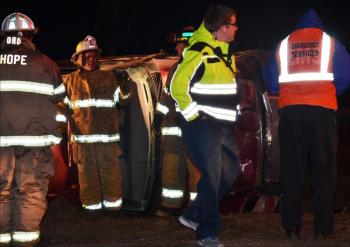 Emergency crews respond to a single-vehicle accident Wednesday evening, Nov. 14, on Route 235 (Hatchet Mountain Road) near Payson Path. (Photo by Lynda Clancy)