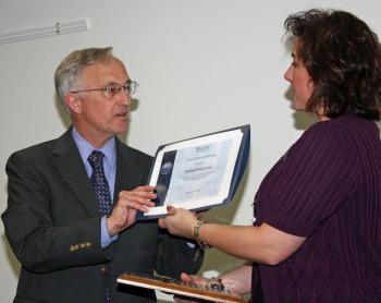 Lee Woodward of Belfast Rotary Club and Andrea Rouillard, Hutchinson Center staff member. (Photo by Holly S. Edwards)