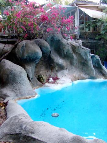 S.E.A. Ltd of Camden gives you a secluded, lush tropical jungle setting on two floors of a real coral rock house. (Photo courtesy of S.E.A. Ltd.)