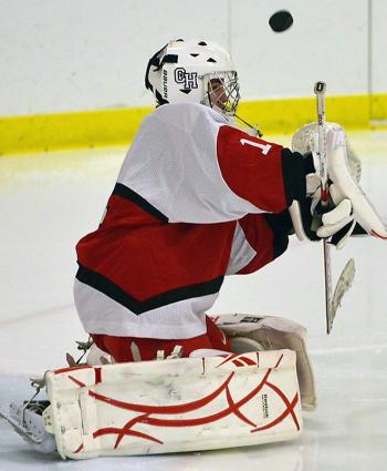 Camden Hills Jet Magri makes a save. (Photo by Ron Hawkes)